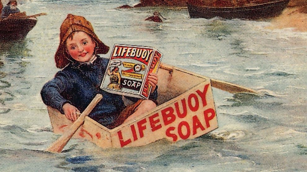 Child in a Lifebuoy Soap boat